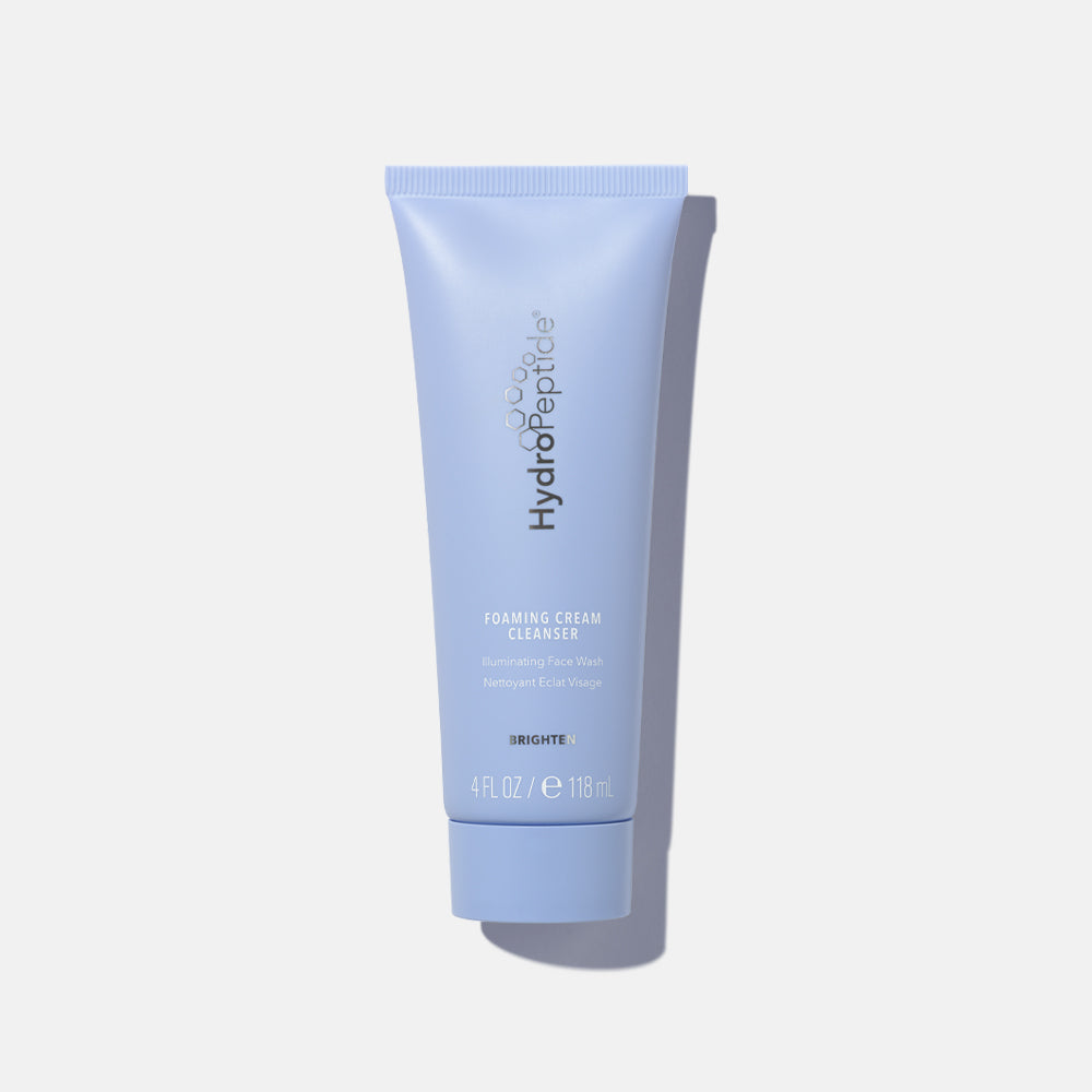 HydroPeptide Foaming Cream Cleanser tube on a clean background, brightening cream-to-foam facial cleanser.