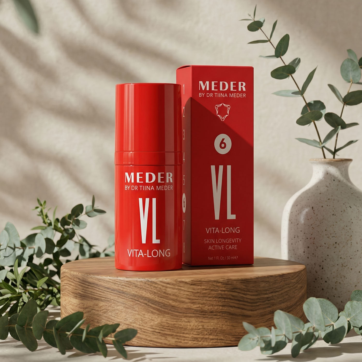 Red Meder VL Vita-Long Oil skincare product on a wooden stand with greenery around