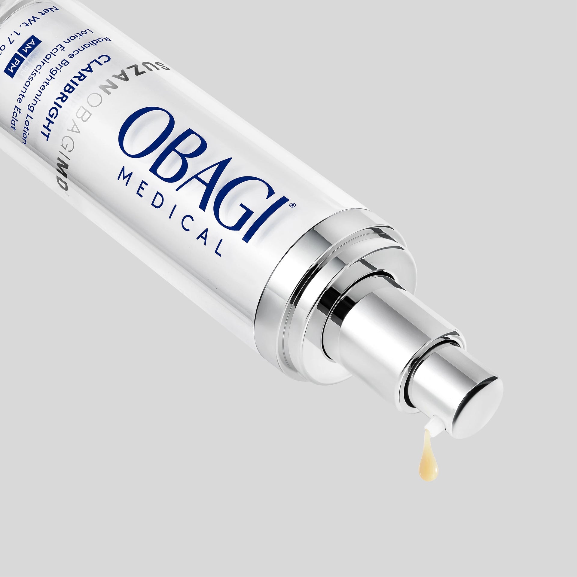 Obagi CLARIBRIGHT SUZANOBAGIMD Radiance Brightening Lotion with a droplet on a light gray background