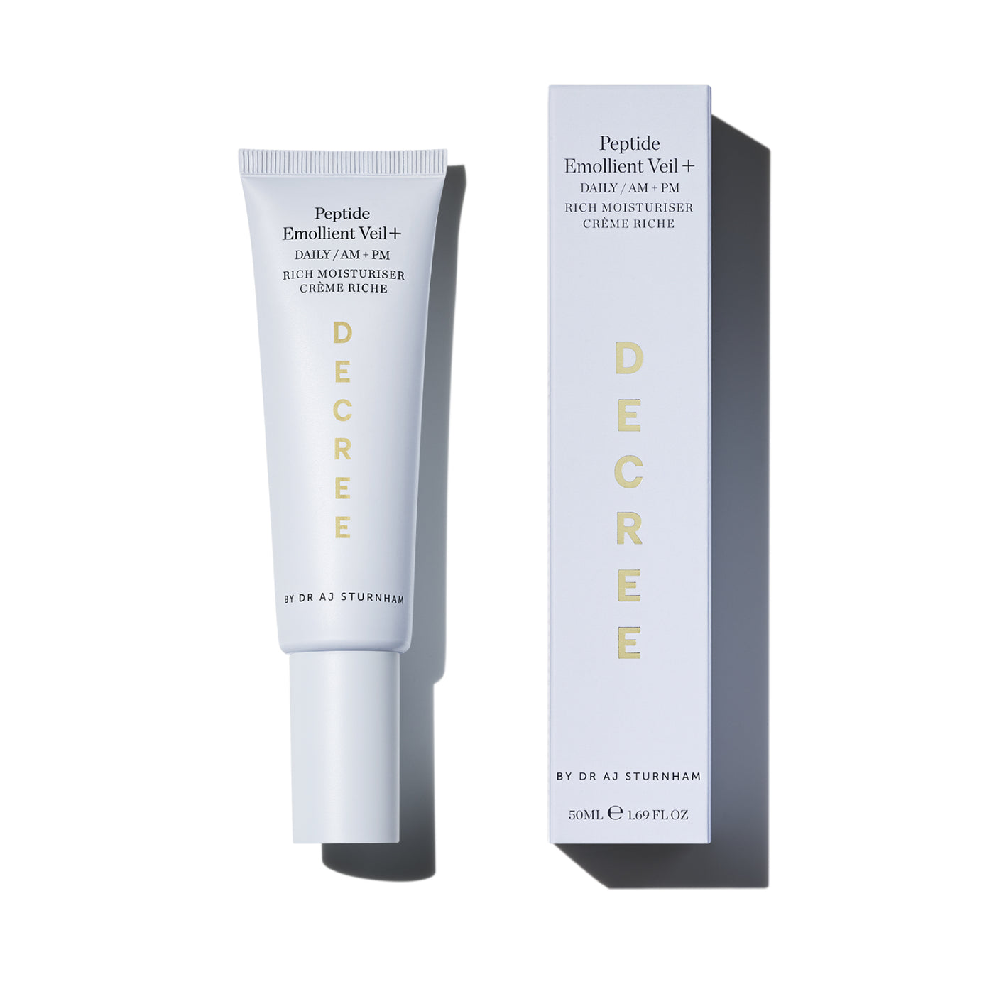 Decree skincare product tube and packaging on a white background. Decree Peptide Emollient Veil+ rich peptide moisturiser with apricot kernel oil, squalane, hyaluronic acid, and resveratrol.
