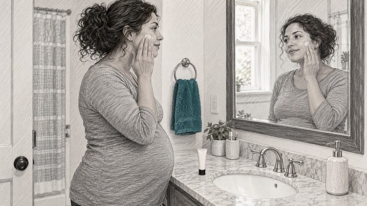 Pregnant woman applying topical cream at home
