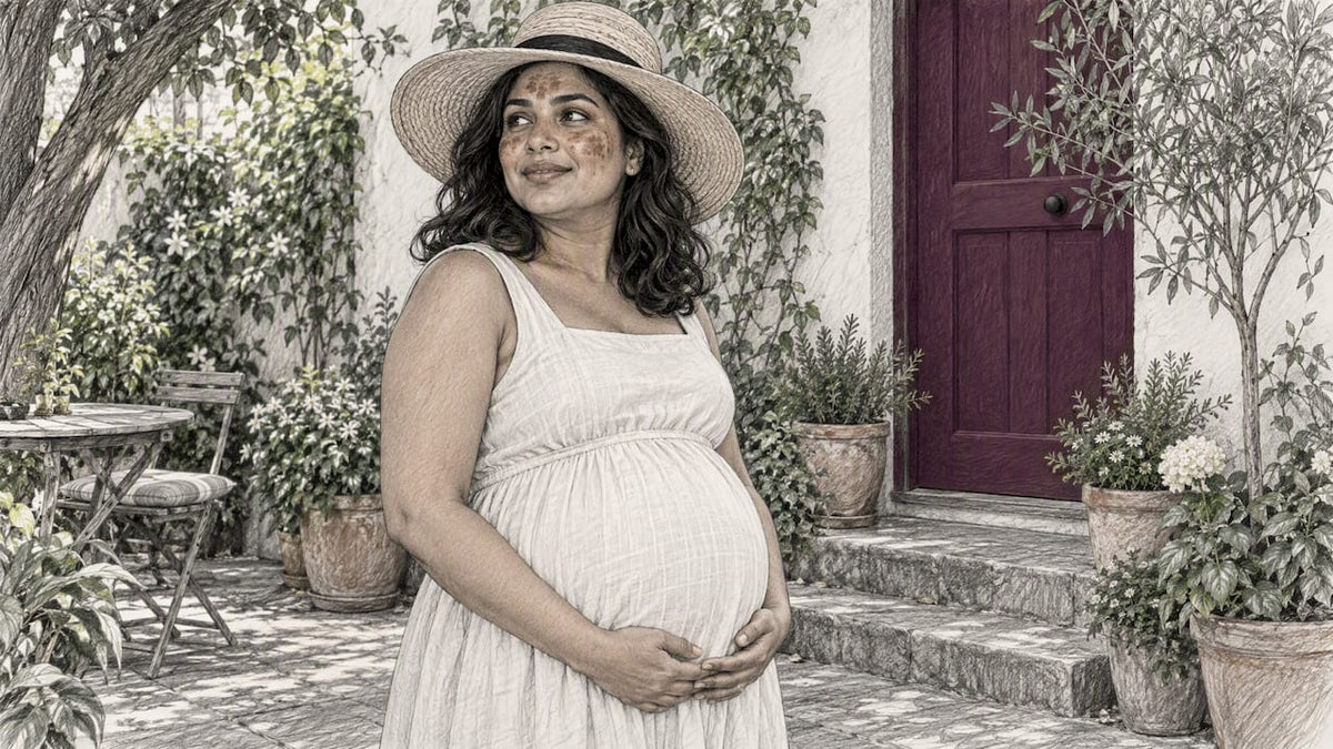 Pregnant woman wearing sun hat with facial melasma