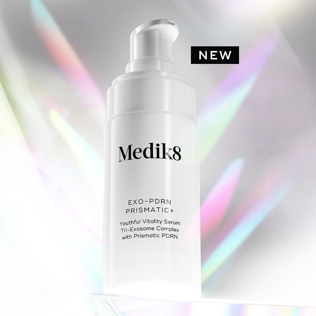 Medik8 Exo-PDRN Prismatic serum bottle with colorful light effects on a white background