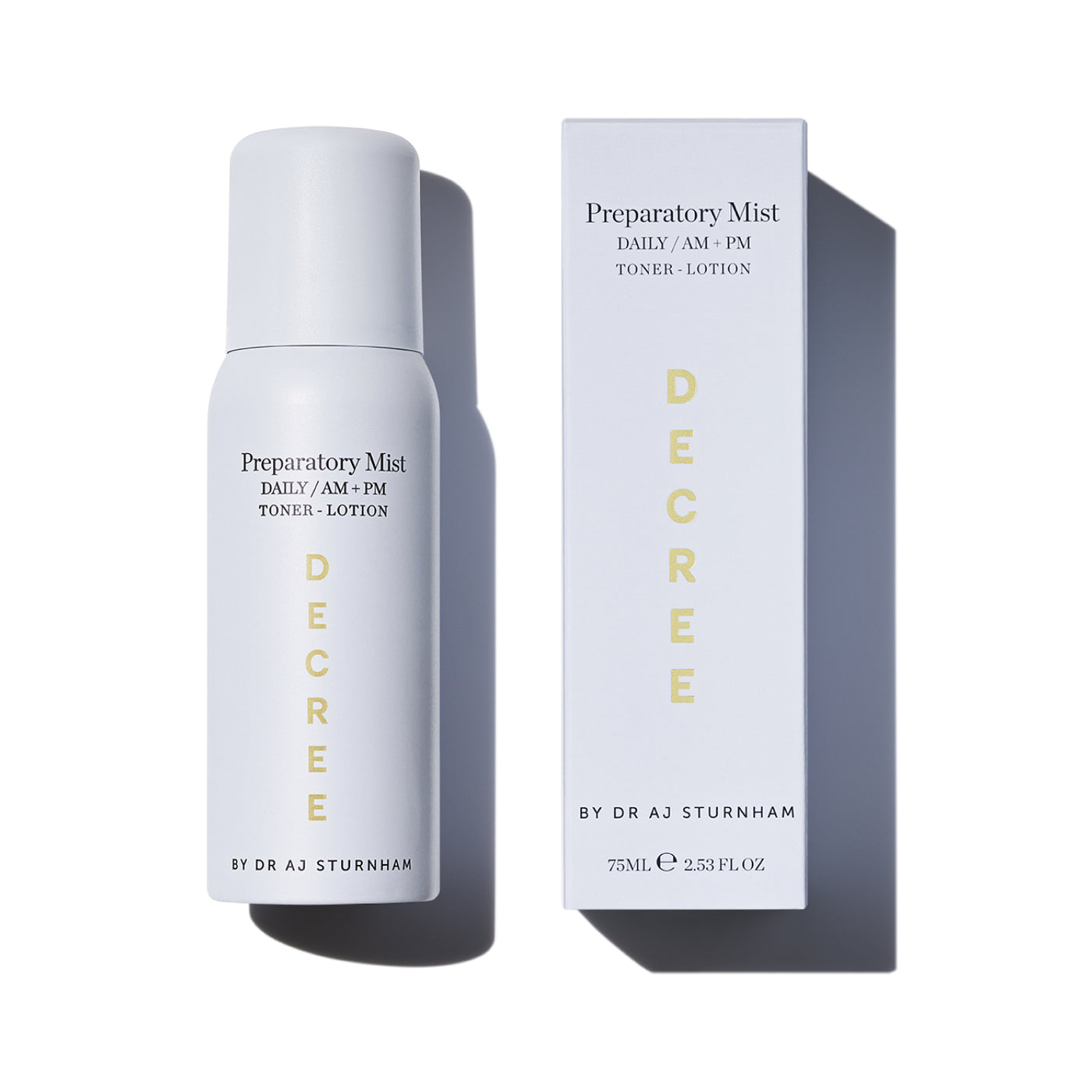 A white cylindrical bottle and matching rectangular box of DEGREE Preparative Mist toner-lotion, shown on a clean white background with soft shadows. Decree Preparatory Mist hydrating facial spray with Ectoin, rose water, aloe vera, and hyaluronic acid.