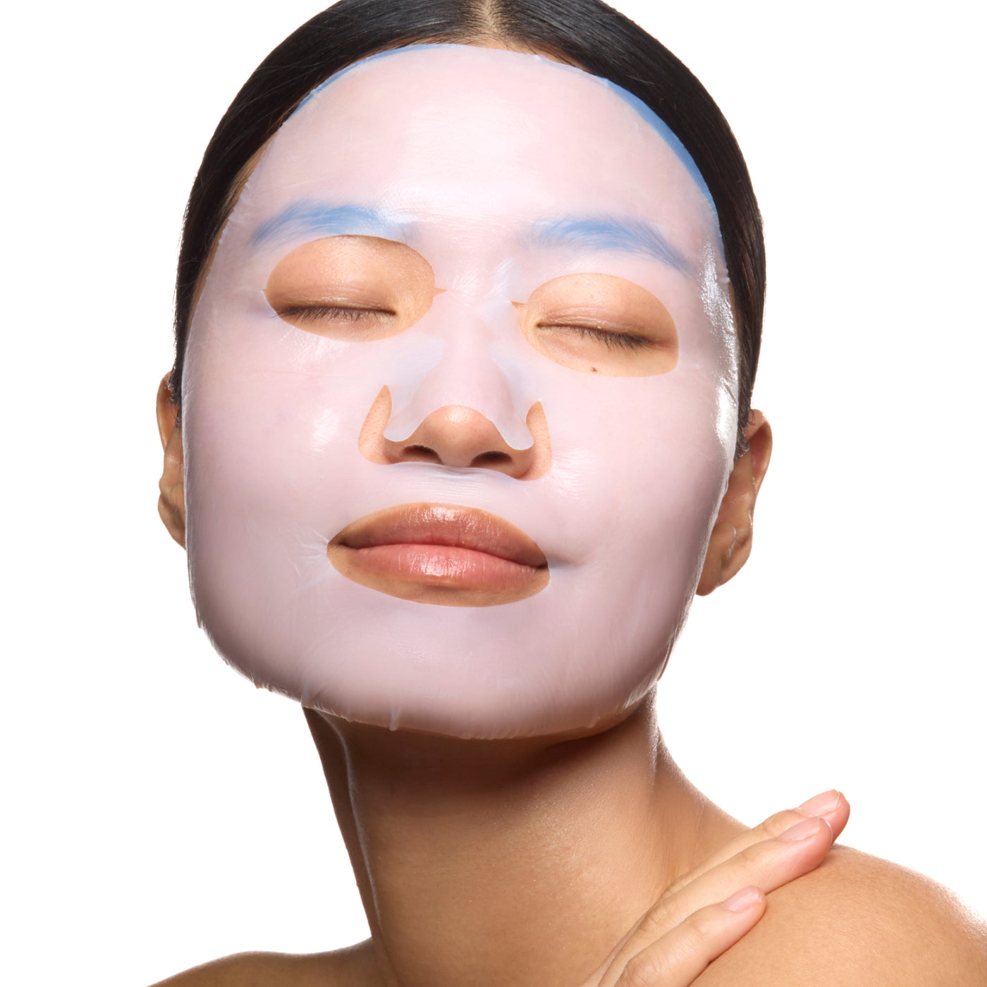 Decree SOS Revitalising bio-cellulose sheet mask applied to the face during a weekly skincare treatment.