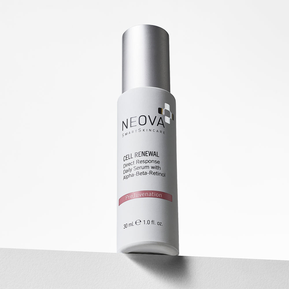 A 30 mL white bottle of Neova Skincare Cell Renewal serum with a metallic silver cap, standing on a light gray surface against a white background.