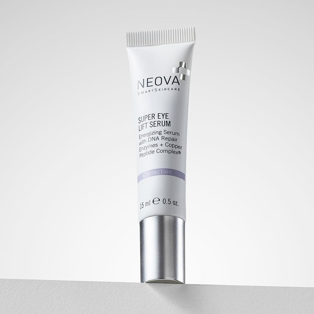 Neova Super Eye Lift Serum tube on a light gray background. NEOVA Super Eye Lift Serum with cooling applicator for firming, brightening, and hydrating the delicate eye area.
